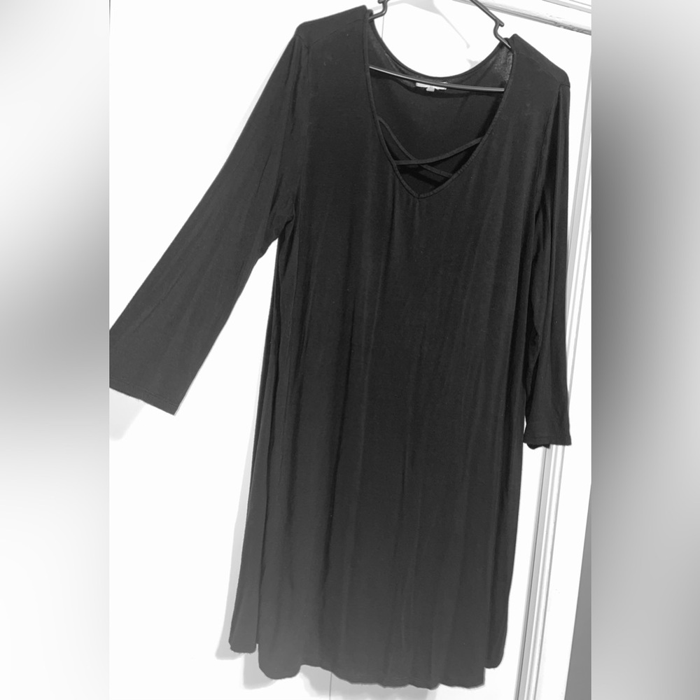 Maurice’s black dress.